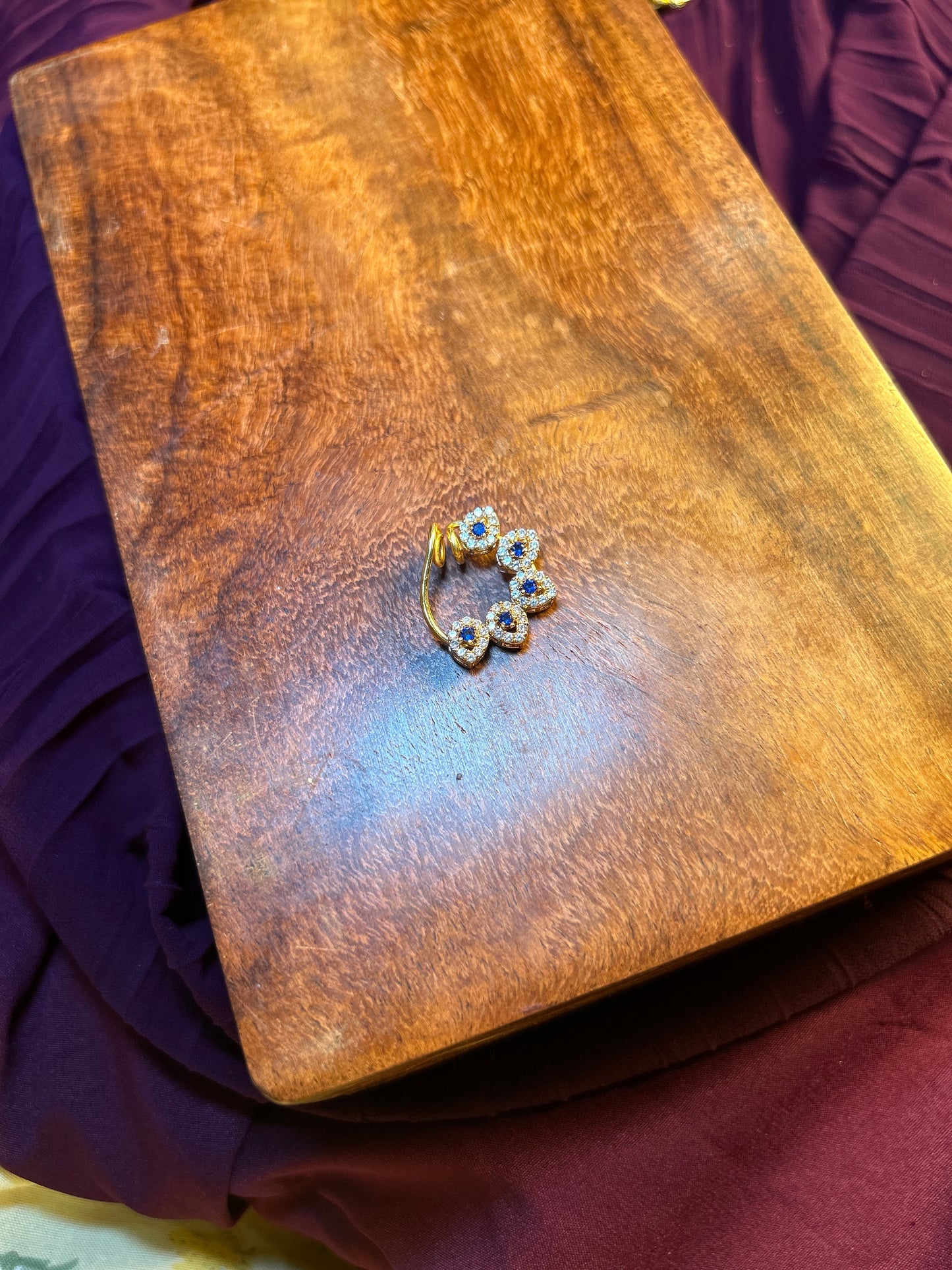 Blue Stone Floral Nath – 1 Gram Gold