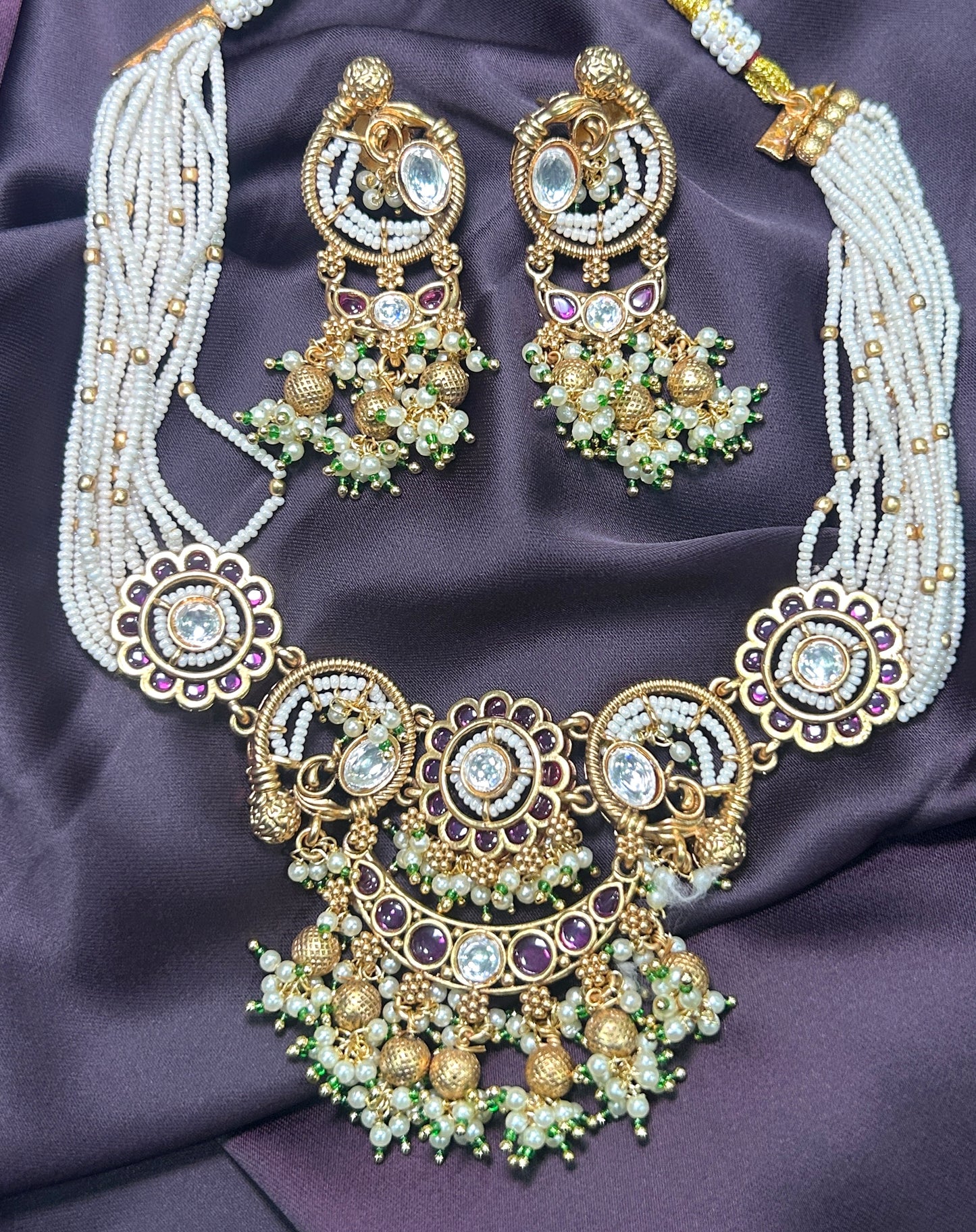 Pearl Beaded Kundan Necklace Set with Purple Accents