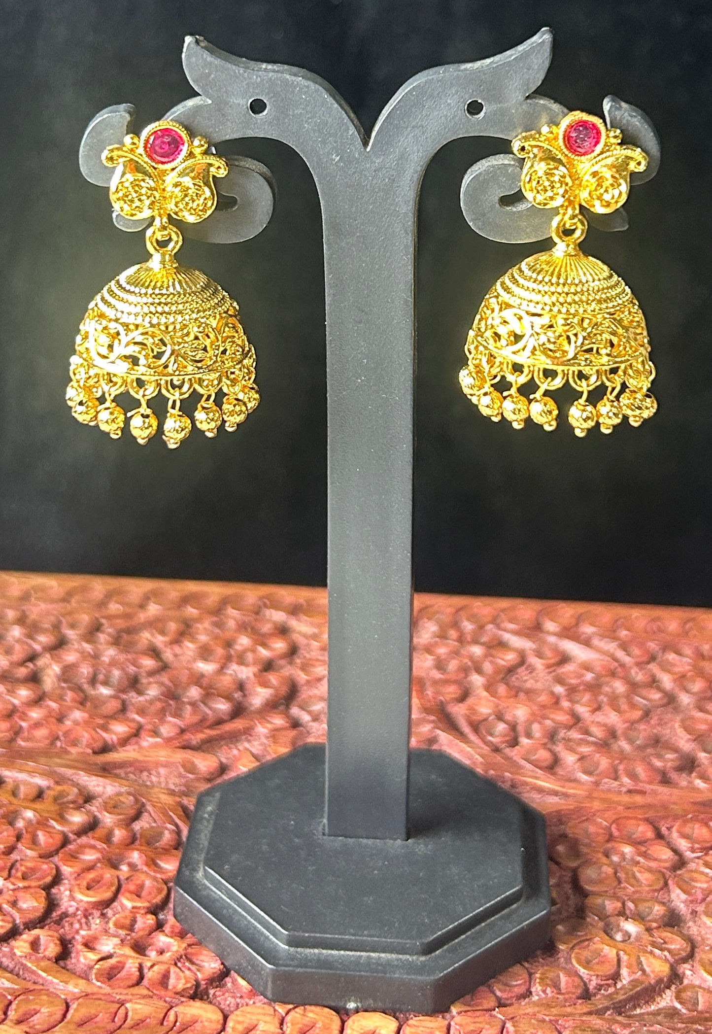 Classic Gold Jhumkas with Butterfly Stud & Red Stone Accent