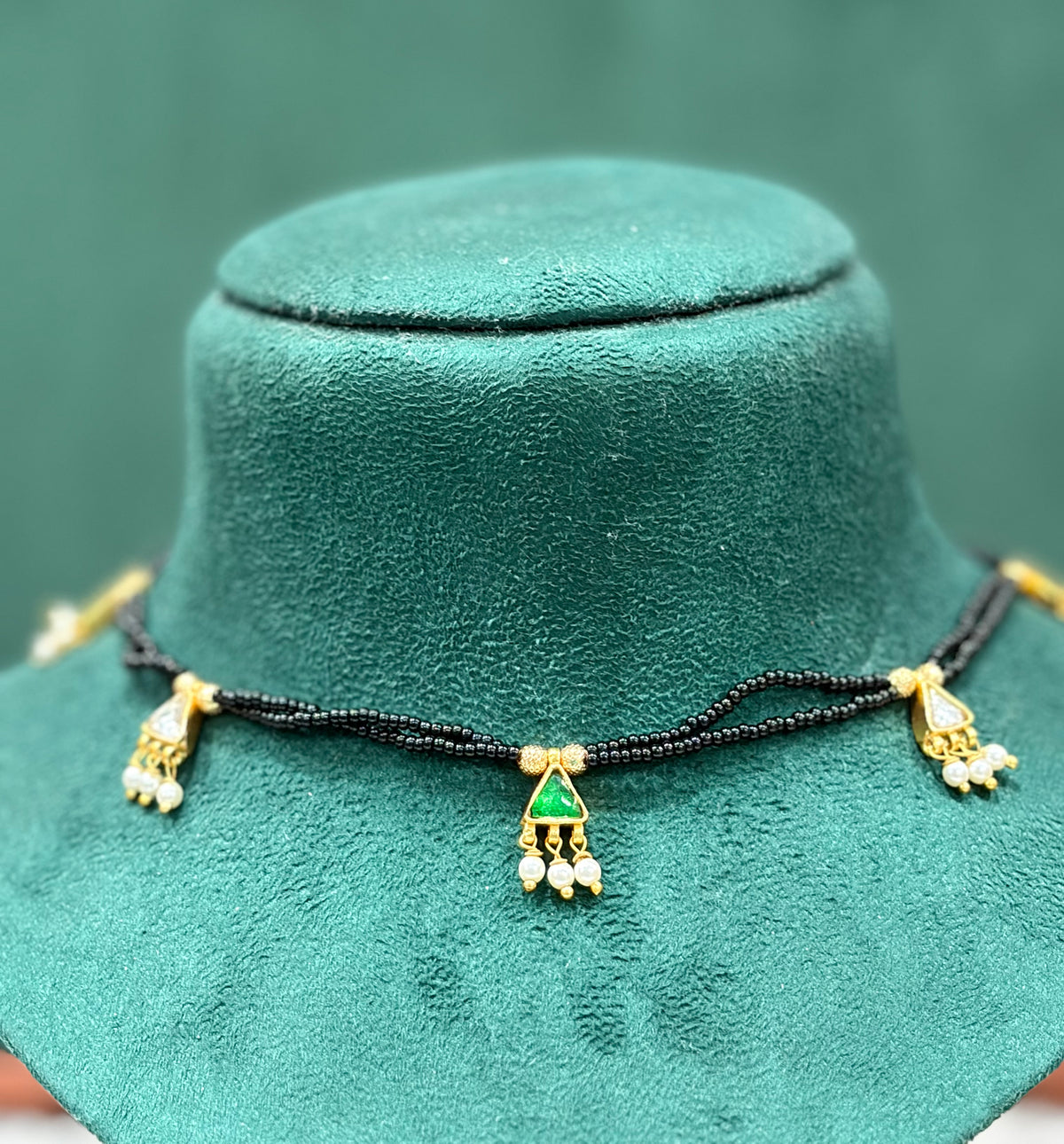 Green Triangle Paachi Kundan Black Beaded Necklace with Pearl Drops