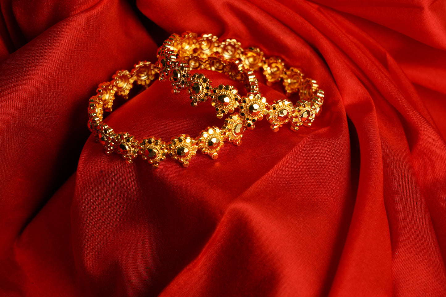 Gold floral bangles