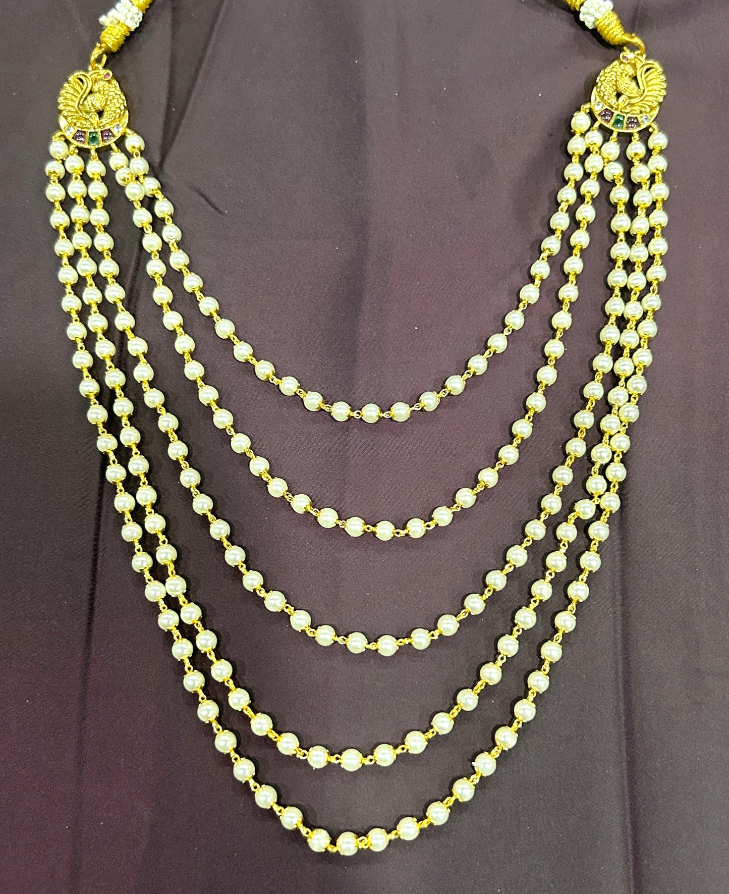 Regal5LayerPearlMalawithPeacock Side Motifs
