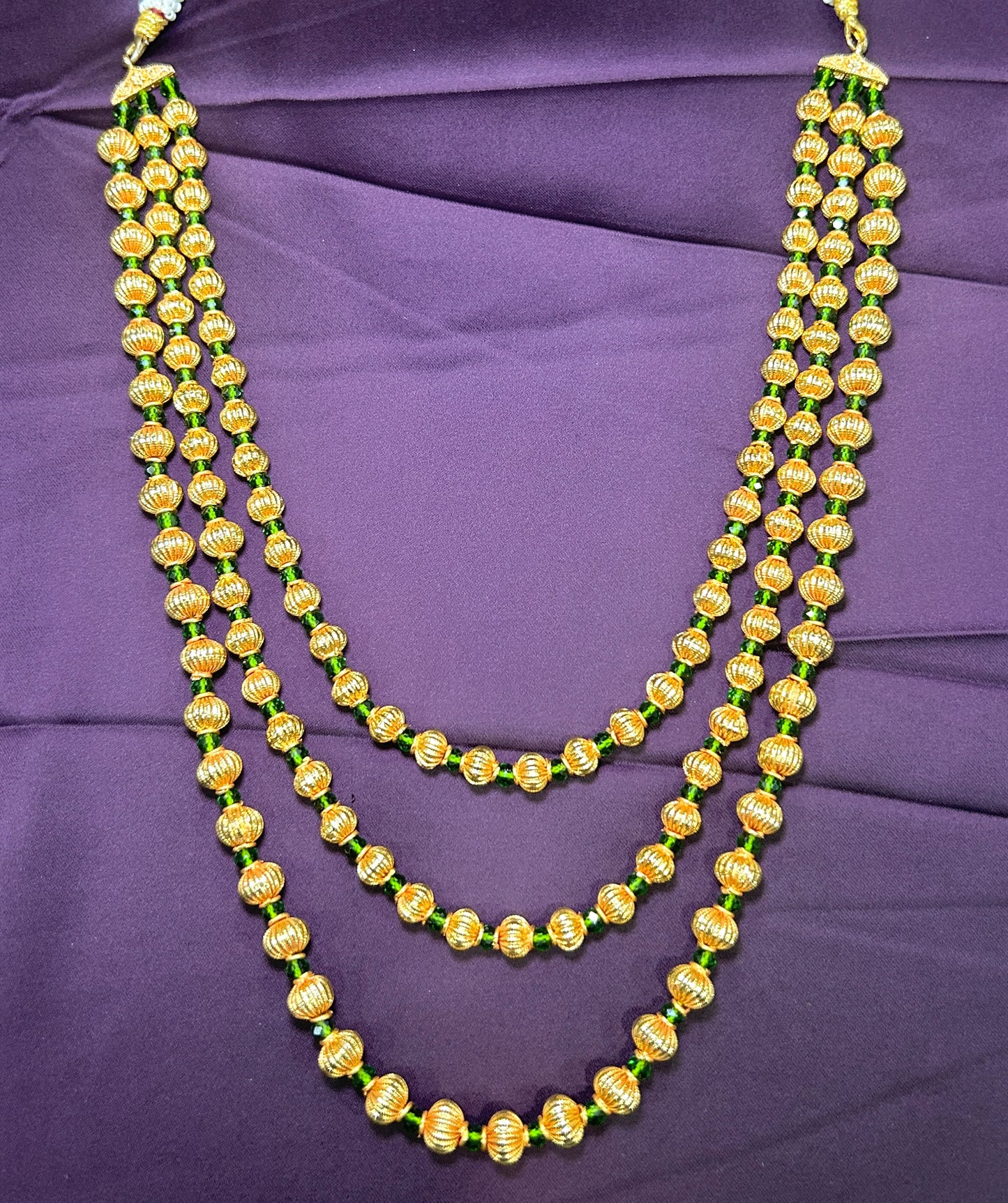 Three-Layer Round Beaded Ganthan with Green Accents