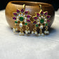 Pachi Kundan Floral Sunburst Bugdi Earrings