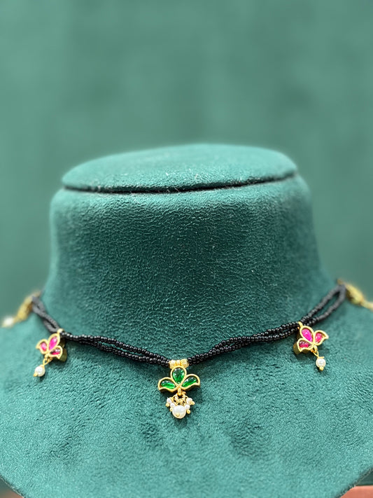 Paachi Kundan Black Beaded Necklace with Green & Pink Floral Pendant