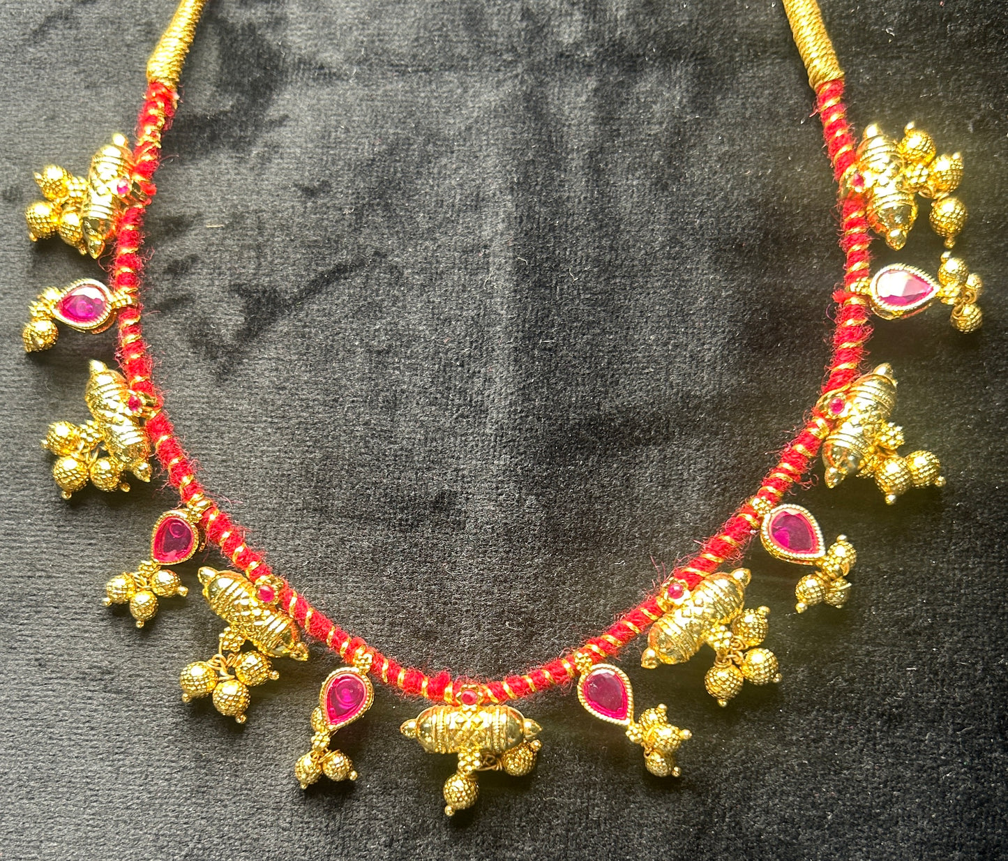 Gajara Thushi with Red Thread and Ruby Stones