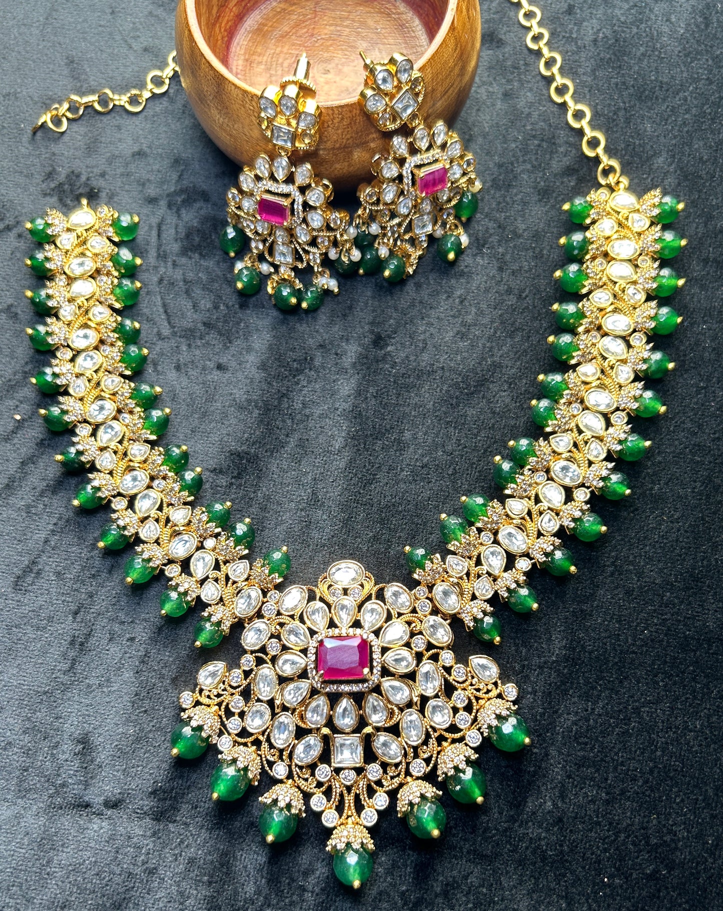 Royal Emerald Kundan Bridal Set – Ruby Red Centerpiece