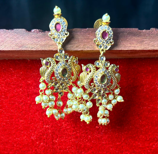 Peacock Motif Kundan Earrings with Pearl Clusters