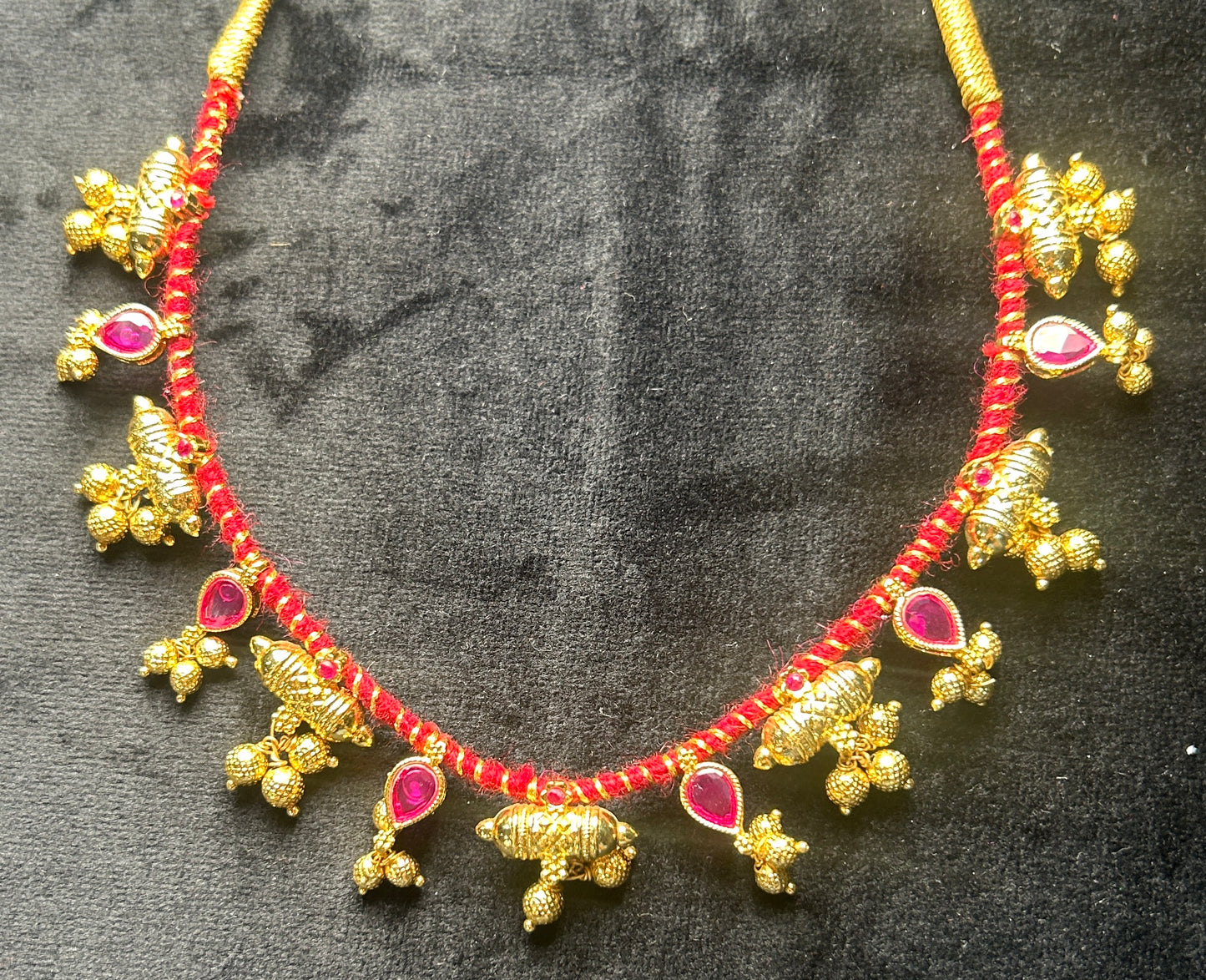 Gajara Thushi with Red Thread and Ruby Stones
