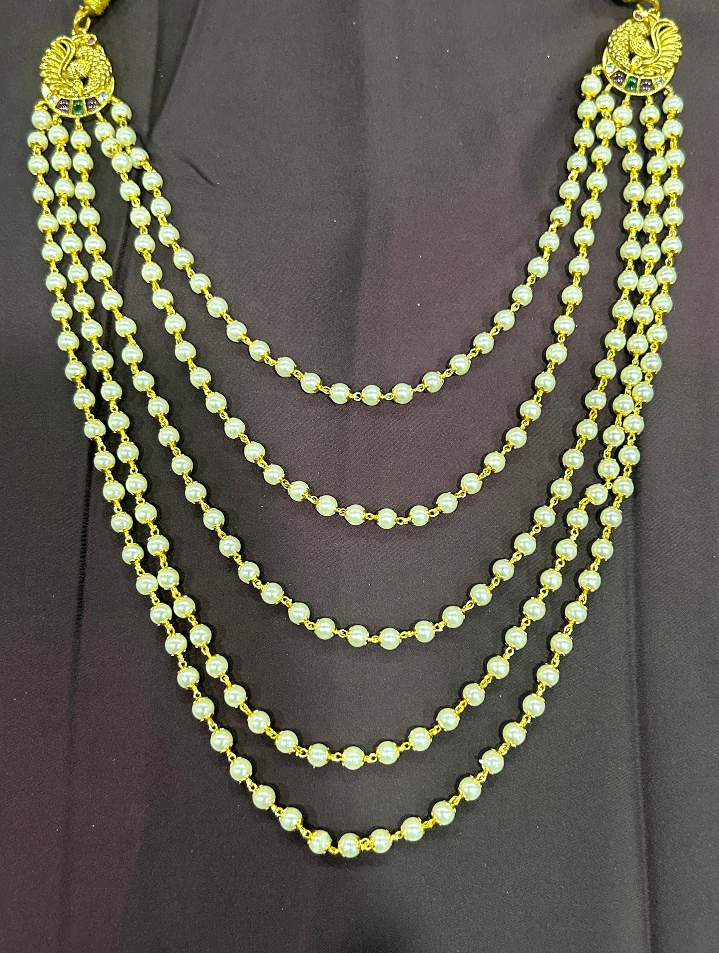 Regal5LayerPearlMalawithPeacock Side Motifs