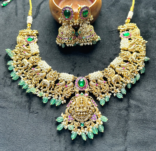 Divine Lakshmi Temple Necklace Set with Lion & Elephant Motifs – Green Stone Highlights