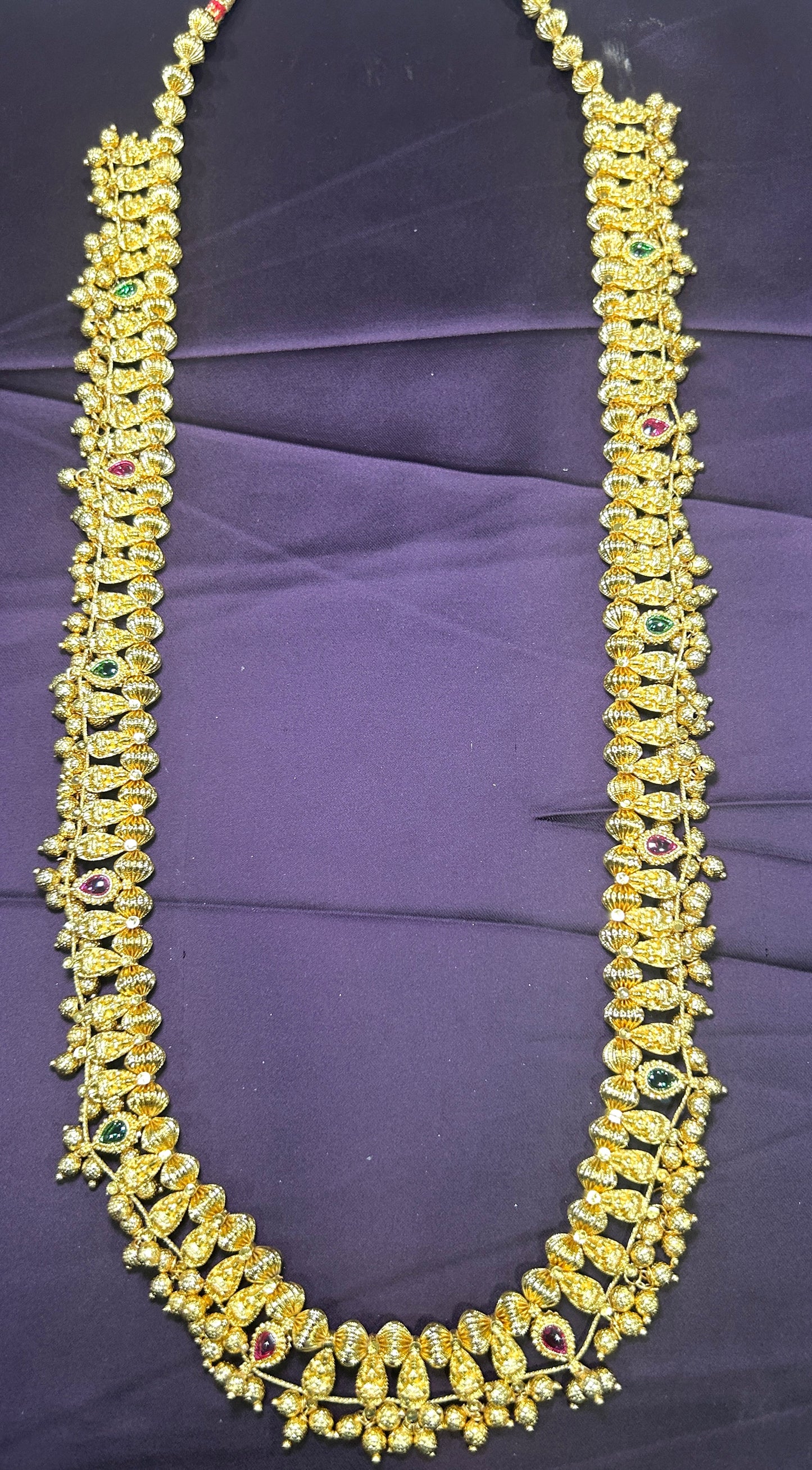 Temple-Style Long Haar with Gold-Tone Motifs & Gem Accents