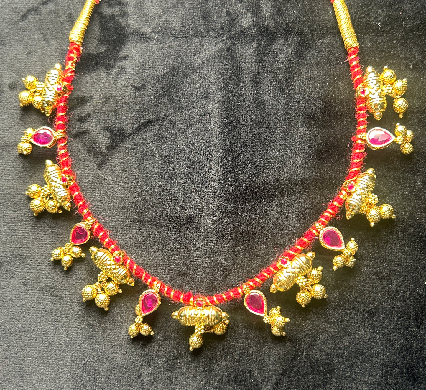 Gajara Thushi with Red Thread and Ruby Stones