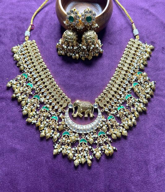 Royal Pachikundan Elephant Motif Necklace Set with Emerald Accents