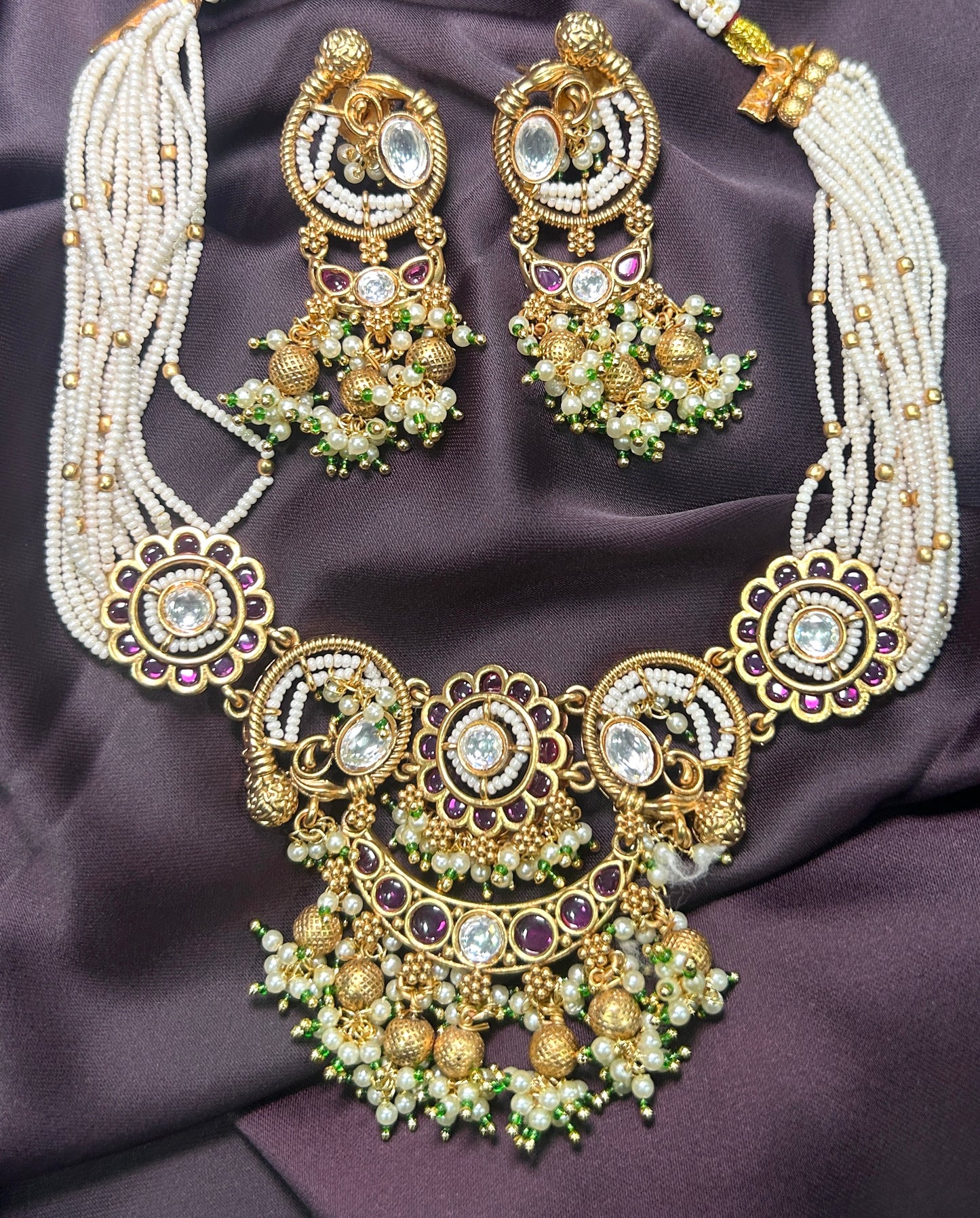 Pearl Beaded Kundan Necklace Set with Purple Accents