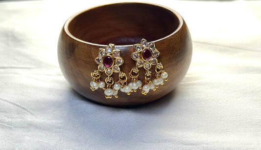 Classic Floral Kundan Bugdi with Pearls – Antique Gold Finish