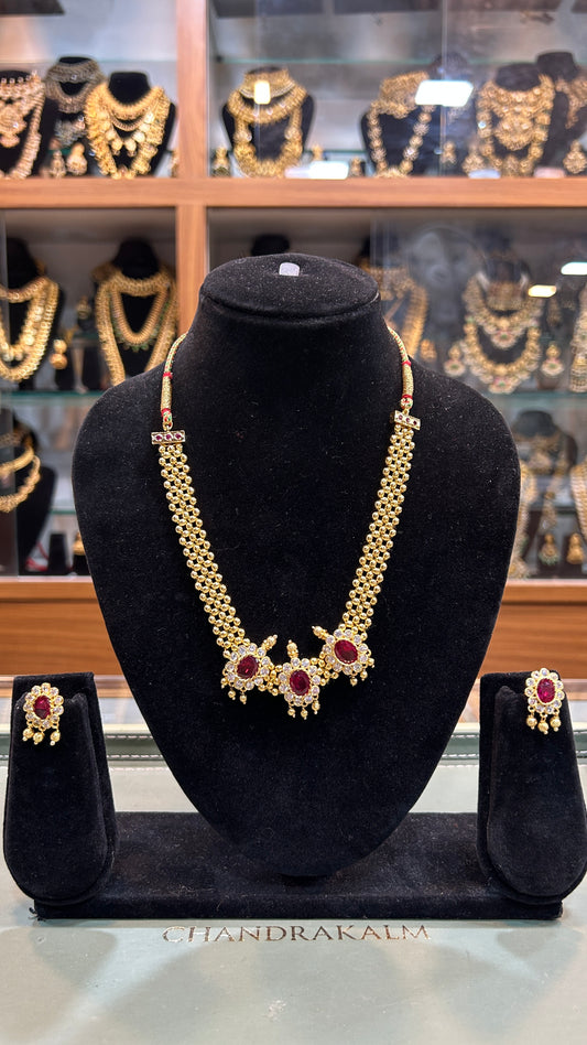 Traditional Gold-Finish Necklace Set with Ruby Accents