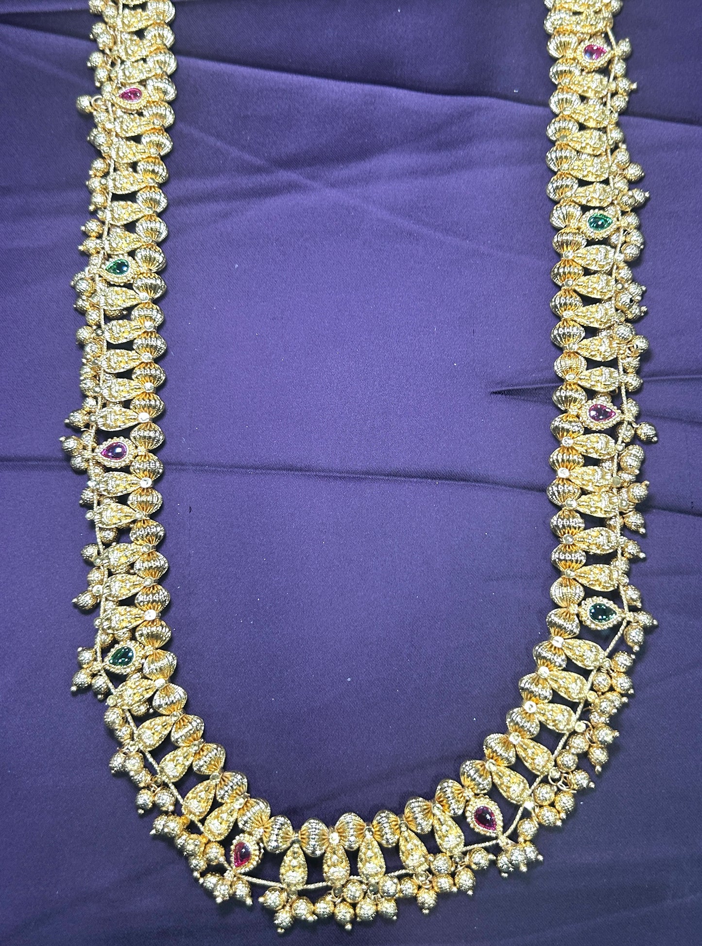 Temple-Style Long Haar with Gold-Tone Motifs & Gem Accents