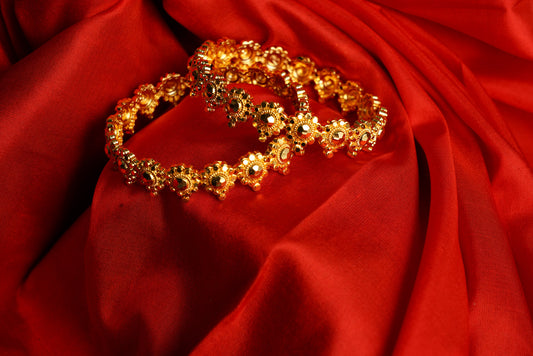Gold floral bangles