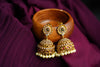 Traditional Gold Jhumka Earrings with Pearl Detailing