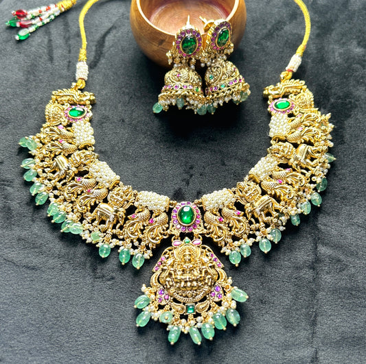 Divine Lakshmi Temple Necklace Set with Lion & Elephant Motifs – Green Stone Highlights