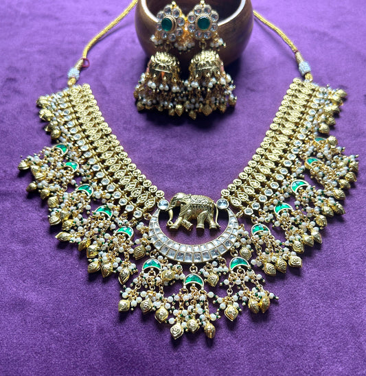 Royal Pachikundan Elephant Motif Necklace Set with Emerald Accents
