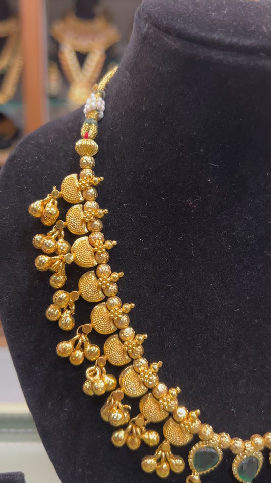 Classic Gold-Finish Temple Necklace with Green Stone Accents