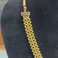 Traditional Gold-Finish Necklace Set with Ruby Accents